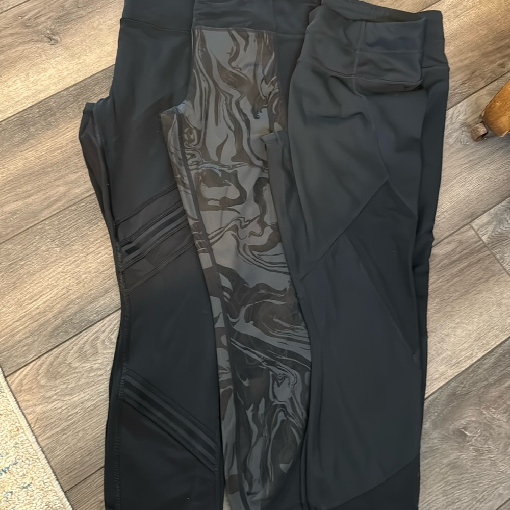 Three pairs of Athleta leggings workout pants size medium